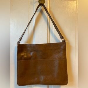 Neely Mack brown leather purse. One strap. Blue interior.
